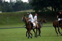 Pluma Negra (white) v Shoreline (black) in the Brecknock Cup Subsidiary final polo match played on Sunday 25 August 2013 at Cowdray Park Polo Club on Ambersham 1. 2013.10.12 www.polopictures.co.uk