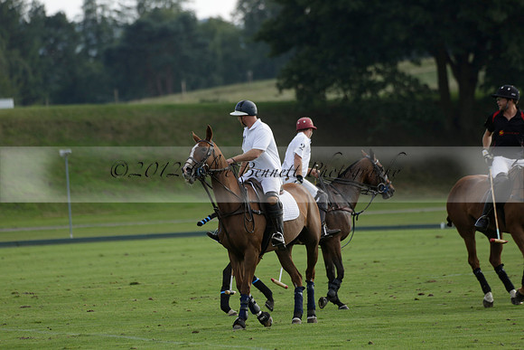 Pluma Negra (white) v Shoreline (black) in the Brecknock Cup Subsidiary final polo match played on Sunday 25 August 2013 at Cowdray Park Polo Club on Ambersham 1. 2013.10.12 www.polopictures.co.uk