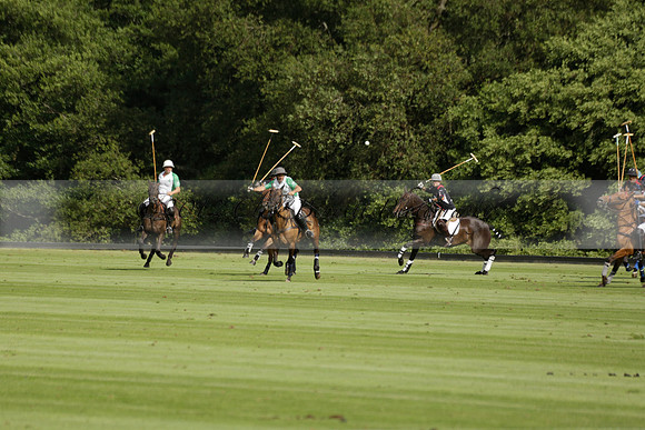 Jaeger Le Coultre (black)  v Wairakei Pastoral (white) in a Jaeger Le Coultre Holden White Cup polo match played on 29 July 2013 at Cowdray Park Polo Club on Brooksfieldwww.polopictures.co.uk