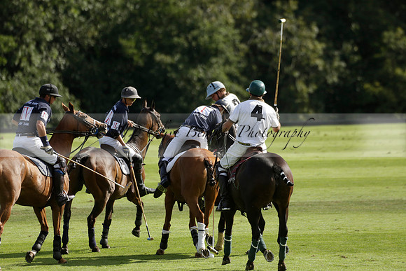 Pandas (white) v Home Farm (navy) in a Park House West Sussex Cup Polo match on Brooksfield at Cowdray Park Polo Club on Friday 30 August 2013. 2013.08.30 www.polopictures.co.uk