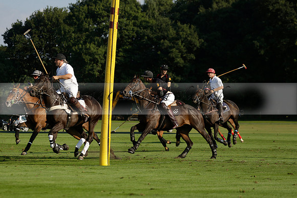Pluma Negra (white) v Shoreline (black) in the Brecknock Cup Subsidiary final polo match played on Sunday 25 August 2013 at Cowdray Park Polo Club on Ambersham 1. 2013.10.12 www.polopictures.co.uk