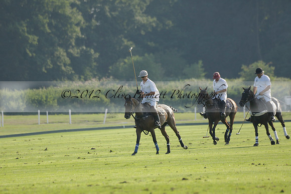 Pluma Negra (white) v Shoreline (black) in the Brecknock Cup Subsidiary final polo match played on Sunday 25 August 2013 at Cowdray Park Polo Club on Ambersham 1. 2013.10.12 www.polopictures.co.uk