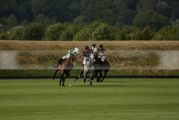 Jaeger Le Coultre (black)  v Wairakei Pastoral (white) in a Jaeger Le Coultre Holden White Cup polo match played on 29 July 2013 at Cowdray Park Polo Club on Brooksfieldwww.polopictures.co.uk