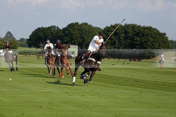 Pluma Negra (white) v Shoreline (black) in the Brecknock Cup Subsidiary final polo match played on Sunday 25 August 2013 at Cowdray Park Polo Club on Ambersham 1. 2013.10.12 www.polopictures.co.uk