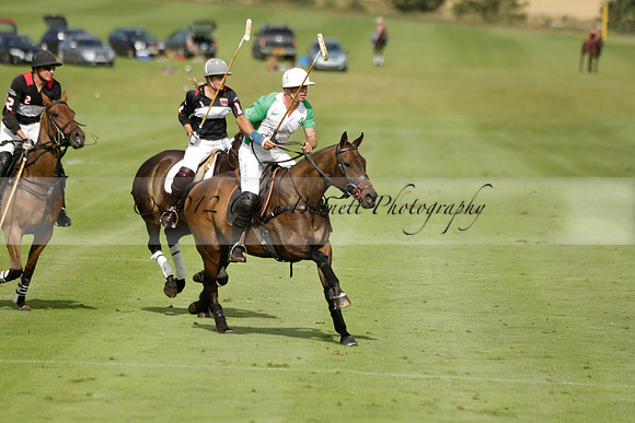 Jaeger Le Coultre (black)  v Wairakei Pastoral (white) in a Jaeger Le Coultre Holden White Cup polo match played on 29 July 2013 at Cowdray Park Polo Club on Brooksfieldwww.polopictures.co.uk