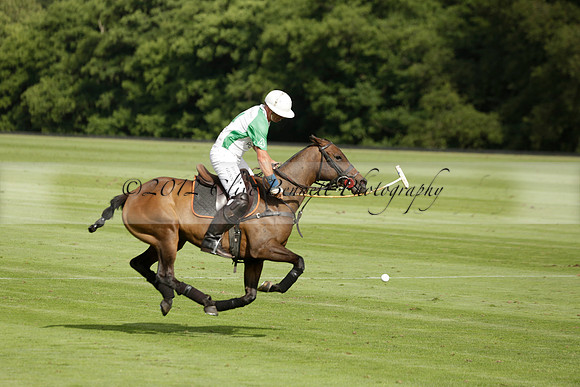 Jaeger Le Coultre (black)  v Wairakei Pastoral (white) in a Jaeger Le Coultre Holden White Cup polo match played on 29 July 2013 at Cowdray Park Polo Club on Brooksfieldwww.polopictures.co.uk