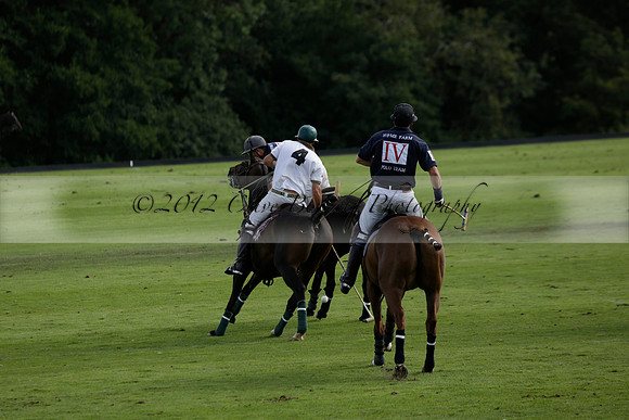 Pandas (white) v Home Farm (navy) in a Park House West Sussex Cup Polo match on Brooksfield at Cowdray Park Polo Club on Friday 30 August 2013. 2013.08.30 www.polopictures.co.uk