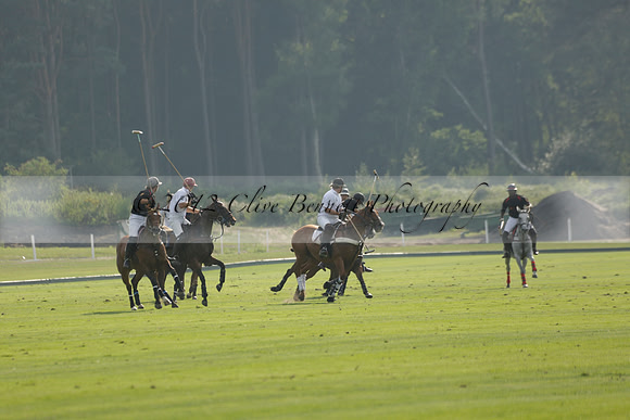 Pluma Negra (white) v Shoreline (black) in the Brecknock Cup Subsidiary final polo match played on Sunday 25 August 2013 at Cowdray Park Polo Club on Ambersham 1. 2013.10.12 www.polopictures.co.uk