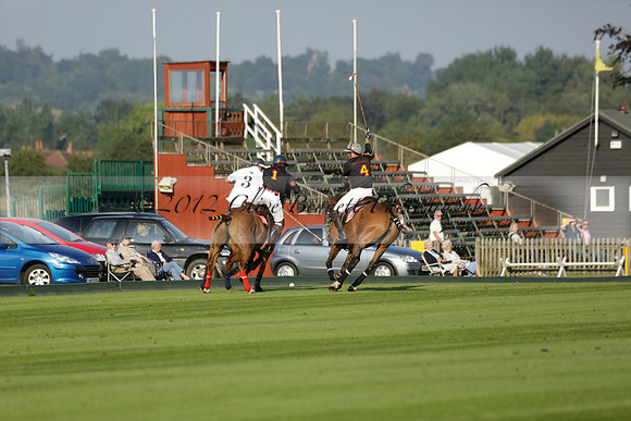 Pluma Negra (white) v Shoreline (black) in the Brecknock Cup Subsidiary final polo match played on Sunday 25 August 2013 at Cowdray Park Polo Club on Ambersham 1. 2013.10.12 www.polopictures.co.uk