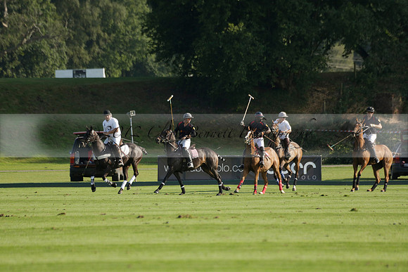 Pluma Negra (white) v Shoreline (black) in the Brecknock Cup Subsidiary final polo match played on Sunday 25 August 2013 at Cowdray Park Polo Club on Ambersham 1. 2013.10.12 www.polopictures.co.uk
