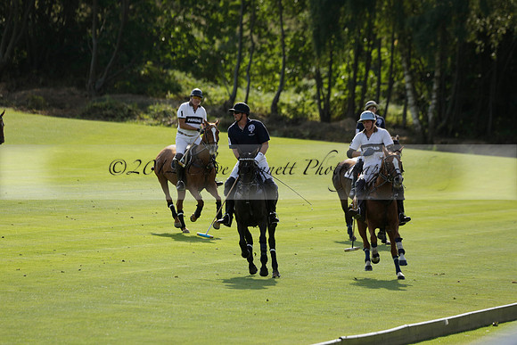 Pandas (white) v Home Farm (navy) in a Park House West Sussex Cup Polo match on Brooksfield at Cowdray Park Polo Club on Friday 30 August 2013. 2013.08.30 www.polopictures.co.uk