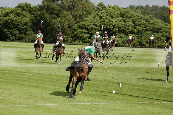 Jaeger Le Coultre (black)  v Wairakei Pastoral (white) in a Jaeger Le Coultre Holden White Cup polo match played on 29 July 2013 at Cowdray Park Polo Club on Brooksfieldwww.polopictures.co.uk