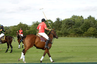 Ice Craft (red) v Hincha Pelota (black) in a Lodsworth Cup Polo match on Ambersham 5 at Cowdray Park Polo Club on Friday 30 August 2013. 2013.08.30 www.polopictures.co.uk