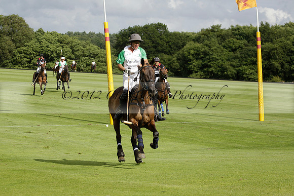 Jaeger Le Coultre (black)  v Wairakei Pastoral (white) in a Jaeger Le Coultre Holden White Cup polo match played on 29 July 2013 at Cowdray Park Polo Club on Brooksfieldwww.polopictures.co.uk