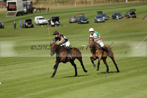 Jaeger Le Coultre (black)  v Wairakei Pastoral (white) in a Jaeger Le Coultre Holden White Cup polo match played on 29 July 2013 at Cowdray Park Polo Club on Brooksfieldwww.polopictures.co.uk