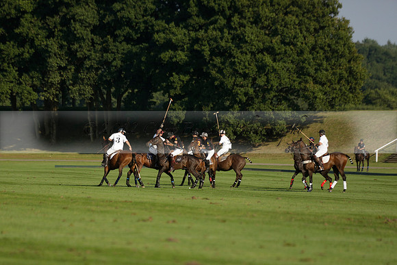 Pluma Negra (white) v Shoreline (black) in the Brecknock Cup Subsidiary final polo match played on Sunday 25 August 2013 at Cowdray Park Polo Club on Ambersham 1. 2013.10.12 www.polopictures.co.uk