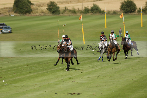 Jaeger Le Coultre (black)  v Wairakei Pastoral (white) in a Jaeger Le Coultre Holden White Cup polo match played on 29 July 2013 at Cowdray Park Polo Club on Brooksfieldwww.polopictures.co.uk