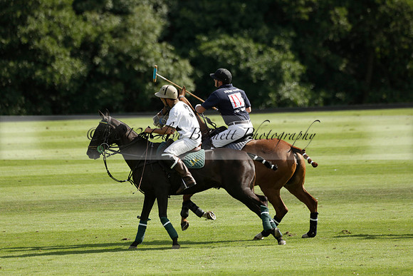 Pandas (white) v Home Farm (navy) in a Park House West Sussex Cup Polo match on Brooksfield at Cowdray Park Polo Club on Friday 30 August 2013. 2013.08.30 www.polopictures.co.uk