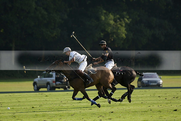 Pluma Negra (white) v Shoreline (black) in the Brecknock Cup Subsidiary final polo match played on Sunday 25 August 2013 at Cowdray Park Polo Club on Ambersham 1. 2013.10.12 www.polopictures.co.uk