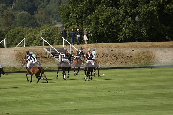 Jaeger Le Coultre (black)  v Wairakei Pastoral (white) in a Jaeger Le Coultre Holden White Cup polo match played on 29 July 2013 at Cowdray Park Polo Club on Brooksfieldwww.polopictures.co.uk