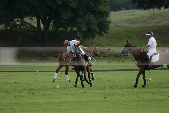 Pluma Negra (white) v Shoreline (black) in the Brecknock Cup Subsidiary final polo match played on Sunday 25 August 2013 at Cowdray Park Polo Club on Ambersham 1. 2013.10.12 www.polopictures.co.uk