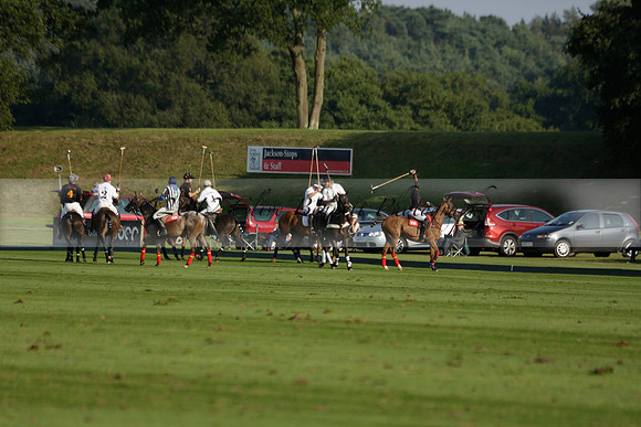 Pluma Negra (white) v Shoreline (black) in the Brecknock Cup Subsidiary final polo match played on Sunday 25 August 2013 at Cowdray Park Polo Club on Ambersham 1. 2013.10.12 www.polopictures.co.uk