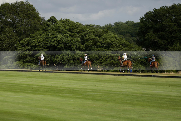 Jaeger Le Coultre (black)  v Wairakei Pastoral (white) in a Jaeger Le Coultre Holden White Cup polo match played on 29 July 2013 at Cowdray Park Polo Club on Brooksfieldwww.polopictures.co.uk