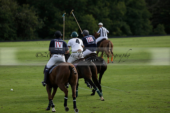 Pandas (white) v Home Farm (navy) in a Park House West Sussex Cup Polo match on Brooksfield at Cowdray Park Polo Club on Friday 30 August 2013. 2013.08.30 www.polopictures.co.uk