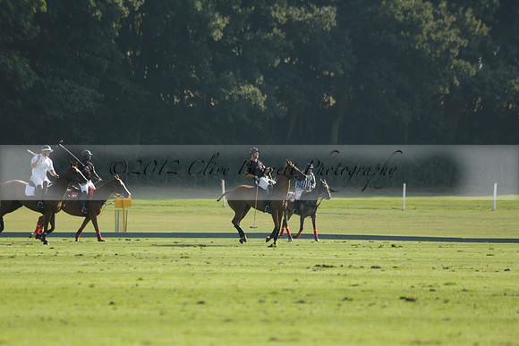 Pluma Negra (white) v Shoreline (black) in the Brecknock Cup Subsidiary final polo match played on Sunday 25 August 2013 at Cowdray Park Polo Club on Ambersham 1. 2013.10.12 www.polopictures.co.uk