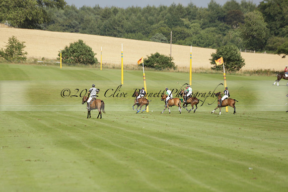 Jaeger Le Coultre (black)  v Wairakei Pastoral (white) in a Jaeger Le Coultre Holden White Cup polo match played on 29 July 2013 at Cowdray Park Polo Club on Brooksfieldwww.polopictures.co.uk