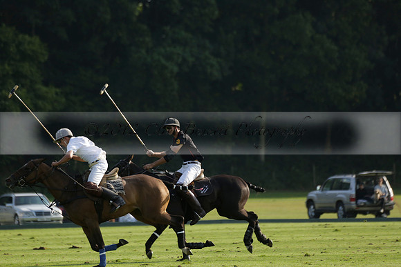 Pluma Negra (white) v Shoreline (black) in the Brecknock Cup Subsidiary final polo match played on Sunday 25 August 2013 at Cowdray Park Polo Club on Ambersham 1. 2013.10.12 www.polopictures.co.uk