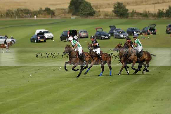 Jaeger Le Coultre (black)  v Wairakei Pastoral (white) in a Jaeger Le Coultre Holden White Cup polo match played on 29 July 2013 at Cowdray Park Polo Club on Brooksfieldwww.polopictures.co.uk