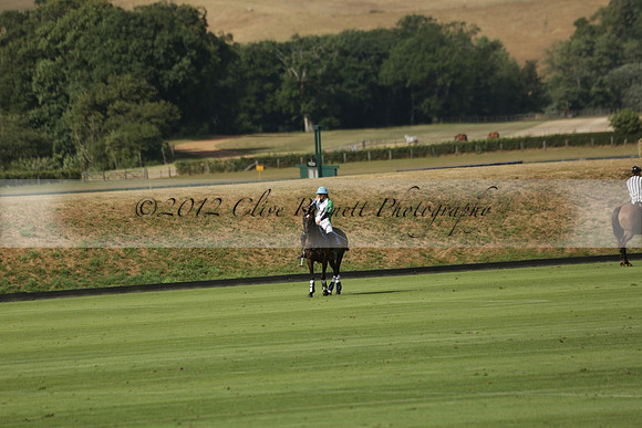 Jaeger Le Coultre (black)  v Wairakei Pastoral (white) in a Jaeger Le Coultre Holden White Cup polo match played on 29 July 2013 at Cowdray Park Polo Club on Brooksfieldwww.polopictures.co.uk