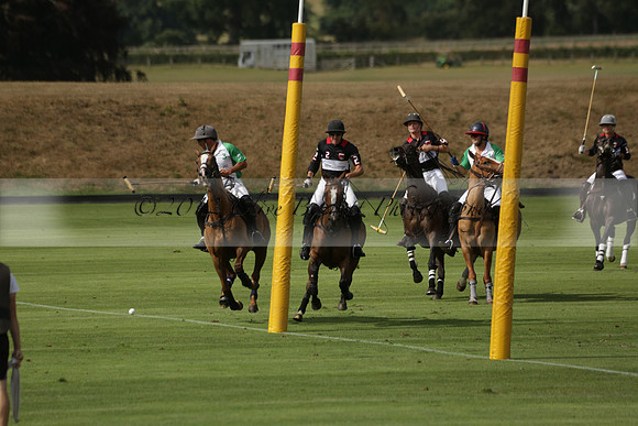 Jaeger Le Coultre (black)  v Wairakei Pastoral (white) in a Jaeger Le Coultre Holden White Cup polo match played on 29 July 2013 at Cowdray Park Polo Club on Brooksfieldwww.polopictures.co.uk