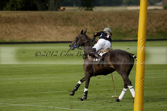 Jaeger Le Coultre (black)  v Wairakei Pastoral (white) in a Jaeger Le Coultre Holden White Cup polo match played on 29 July 2013 at Cowdray Park Polo Club on Brooksfieldwww.polopictures.co.uk