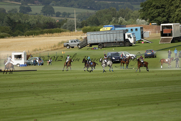 Jaeger Le Coultre (black)  v Wairakei Pastoral (white) in a Jaeger Le Coultre Holden White Cup polo match played on 29 July 2013 at Cowdray Park Polo Club on Brooksfieldwww.polopictures.co.uk
