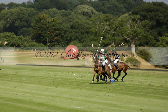 Jaeger Le Coultre (black)  v Wairakei Pastoral (white) in a Jaeger Le Coultre Holden White Cup polo match played on 29 July 2013 at Cowdray Park Polo Club on Brooksfieldwww.polopictures.co.uk