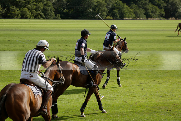 Pandas (white) v Home Farm (navy) in a Park House West Sussex Cup Polo match on Brooksfield at Cowdray Park Polo Club on Friday 30 August 2013. 2013.08.30 www.polopictures.co.uk