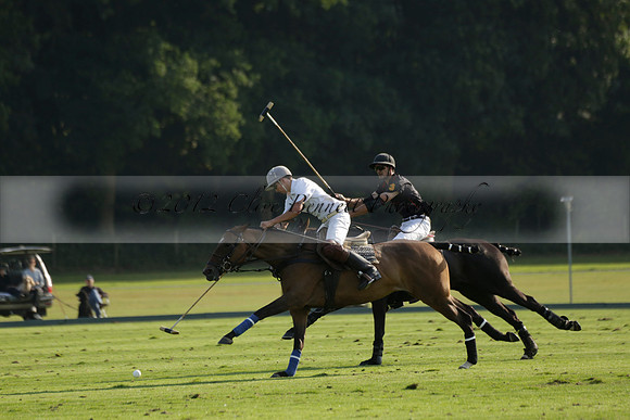 Pluma Negra (white) v Shoreline (black) in the Brecknock Cup Subsidiary final polo match played on Sunday 25 August 2013 at Cowdray Park Polo Club on Ambersham 1. 2013.10.12 www.polopictures.co.uk