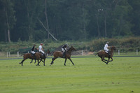 Pluma Negra (white) v Shoreline (black) in the Brecknock Cup Subsidiary final polo match played on Sunday 25 August 2013 at Cowdray Park Polo Club on Ambersham 1. 2013.10.12 www.polopictures.co.uk