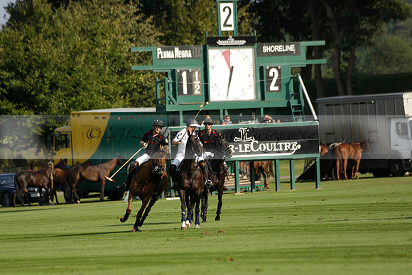 Pluma Negra (white) v Shoreline (black) in the Brecknock Cup Subsidiary final polo match played on Sunday 25 August 2013 at Cowdray Park Polo Club on Ambersham 1. 2013.10.12 www.polopictures.co.uk