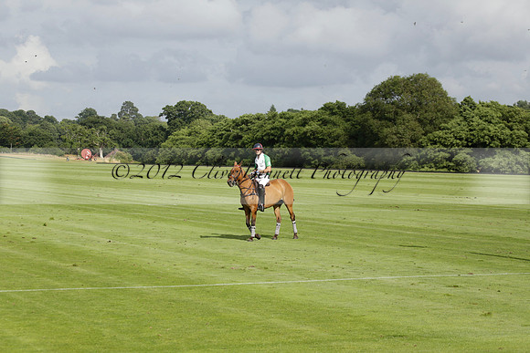 Jaeger Le Coultre (black)  v Wairakei Pastoral (white) in a Jaeger Le Coultre Holden White Cup polo match played on 29 July 2013 at Cowdray Park Polo Club on Brooksfieldwww.polopictures.co.uk