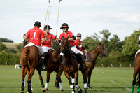 Ice Craft (red) v Hincha Pelota (black) in a Lodsworth Cup Polo match on Ambersham 5 at Cowdray Park Polo Club on Friday 30 August 2013. 2013.08.30 www.polopictures.co.uk