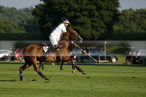 Pluma Negra (white) v Shoreline (black) in the Brecknock Cup Subsidiary final polo match played on Sunday 25 August 2013 at Cowdray Park Polo Club on Ambersham 1. 2013.10.12 www.polopictures.co.uk
