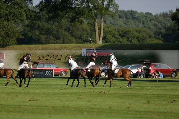 Pluma Negra (white) v Shoreline (black) in the Brecknock Cup Subsidiary final polo match played on Sunday 25 August 2013 at Cowdray Park Polo Club on Ambersham 1. 2013.10.12 www.polopictures.co.uk