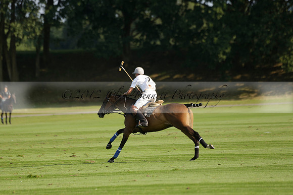 Pluma Negra (white) v Shoreline (black) in the Brecknock Cup Subsidiary final polo match played on Sunday 25 August 2013 at Cowdray Park Polo Club on Ambersham 1. 2013.10.12 www.polopictures.co.uk