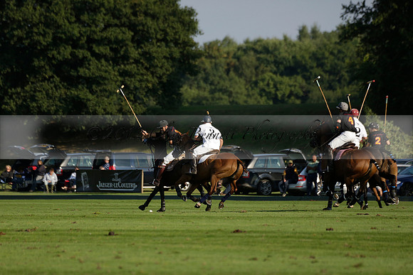 Pluma Negra (white) v Shoreline (black) in the Brecknock Cup Subsidiary final polo match played on Sunday 25 August 2013 at Cowdray Park Polo Club on Ambersham 1. 2013.10.12 www.polopictures.co.uk