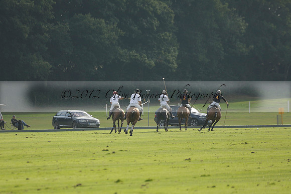 Pluma Negra (white) v Shoreline (black) in the Brecknock Cup Subsidiary final polo match played on Sunday 25 August 2013 at Cowdray Park Polo Club on Ambersham 1. 2013.10.12 www.polopictures.co.uk
