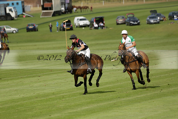 Jaeger Le Coultre (black)  v Wairakei Pastoral (white) in a Jaeger Le Coultre Holden White Cup polo match played on 29 July 2013 at Cowdray Park Polo Club on Brooksfieldwww.polopictures.co.uk