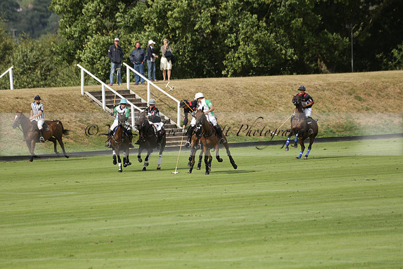 Jaeger Le Coultre (black)  v Wairakei Pastoral (white) in a Jaeger Le Coultre Holden White Cup polo match played on 29 July 2013 at Cowdray Park Polo Club on Brooksfieldwww.polopictures.co.uk